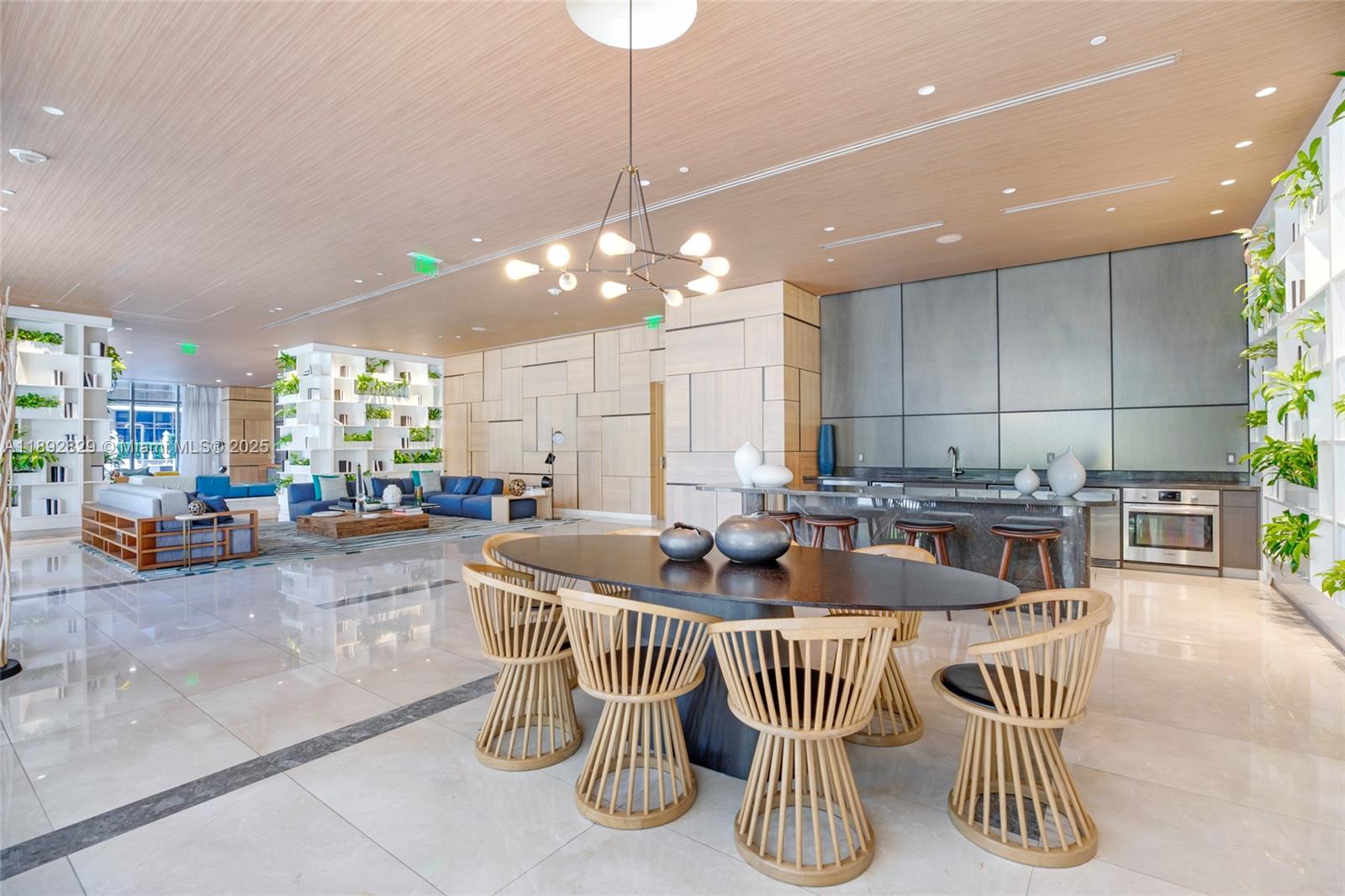 55 Southwest 9th Street, Unit 3205 Miami, FL 33130 - Photo 31 of 39 a dining room with furniture and a large window