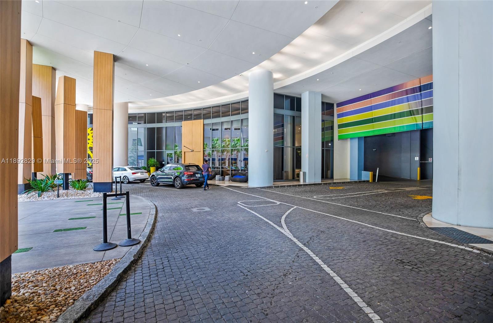 55 Southwest 9th Street, Unit 3205 Miami, FL 33130 - Photo 39 of 39 a living room with furniture and large windows