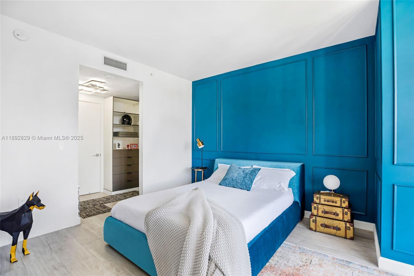 55 Southwest 9th Street, Unit 3205 Miami, FL 33130 - Photo 6 of 39 a bedroom with a bed and a closet