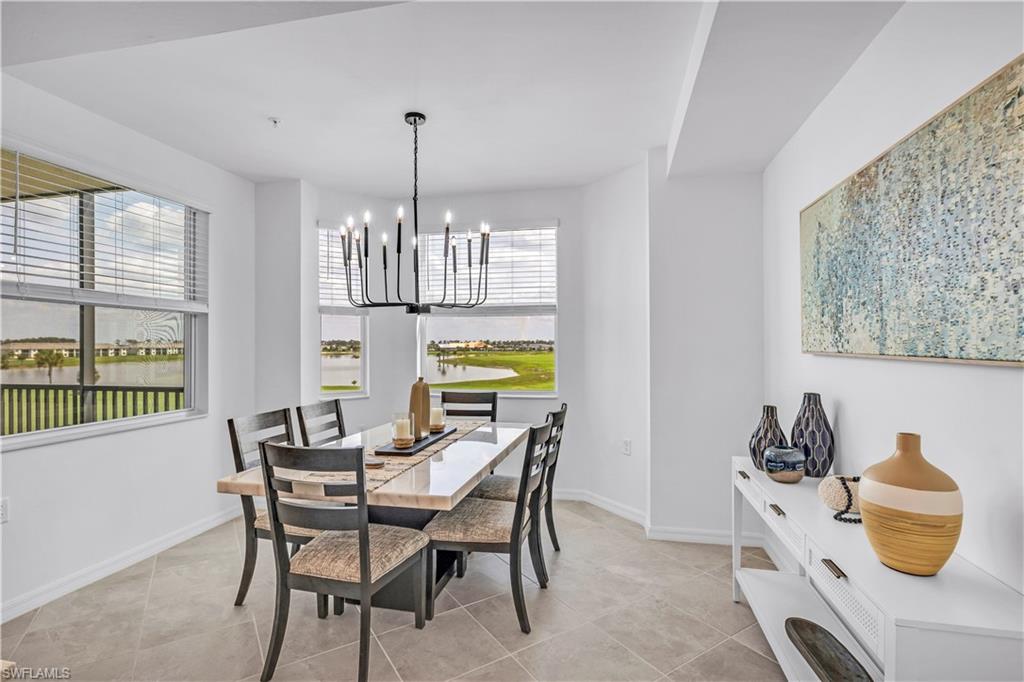 43989 Boardwalk Loop, Unit 2032 Punta Gorda, FL 33982 - Photo 3 of 14 a dining room with furniture and window