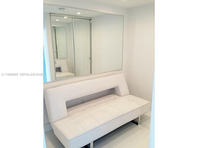 100 Lincoln Road, Unit 1112 Miami Beach, FL 33139 - Photo 19 of 48 a bathroom with a sink and a mirror