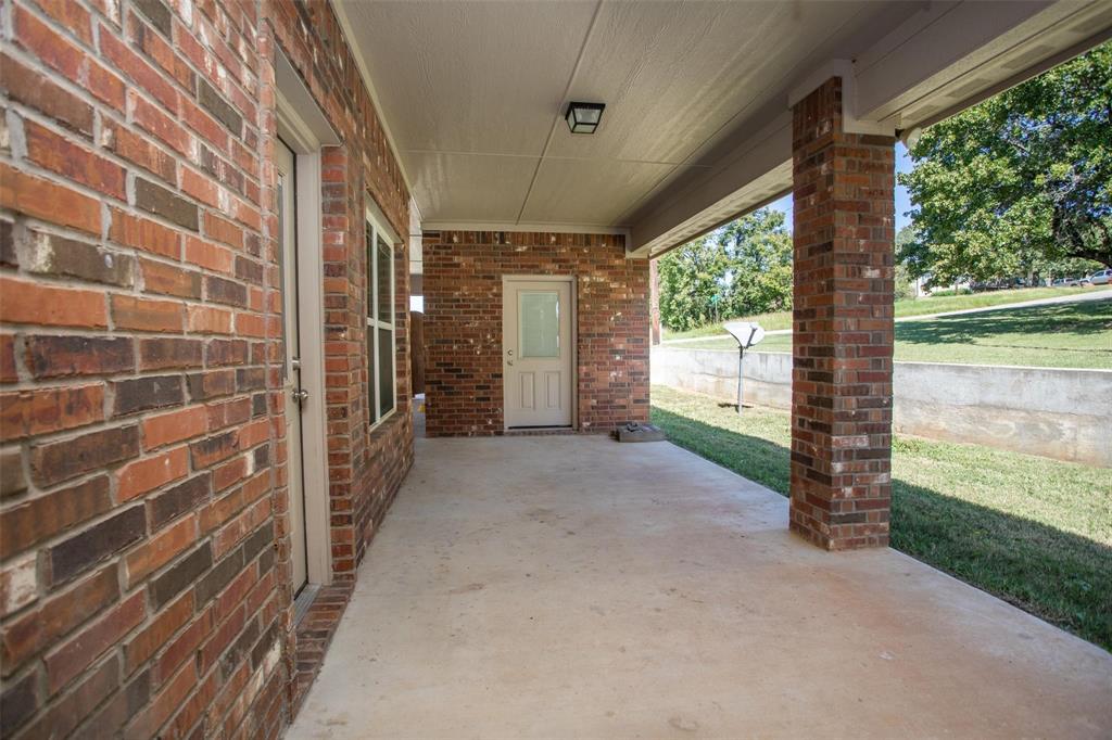 455 Neals Hill Road Oak Ridge, TX 76240 - Photo 5 of 19 View of patio