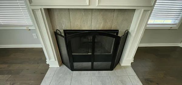 a close view of a utility room with washer and dryer