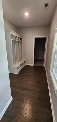 a view of a room with racks on the wall