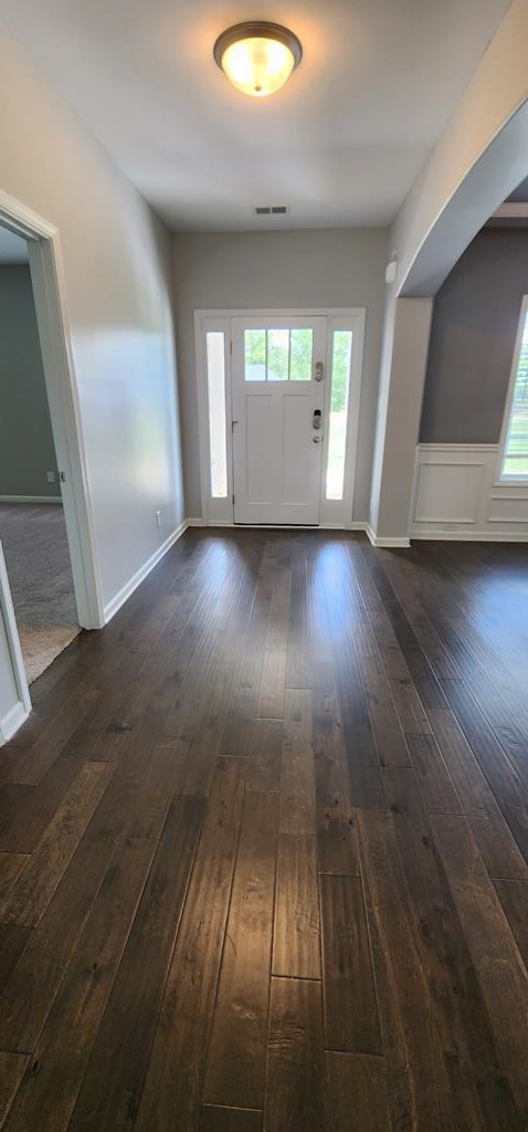 486 Abberly Lane Ellerslie, GA 31807 - Photo 2 of 67 an empty room with wooden floor and windows