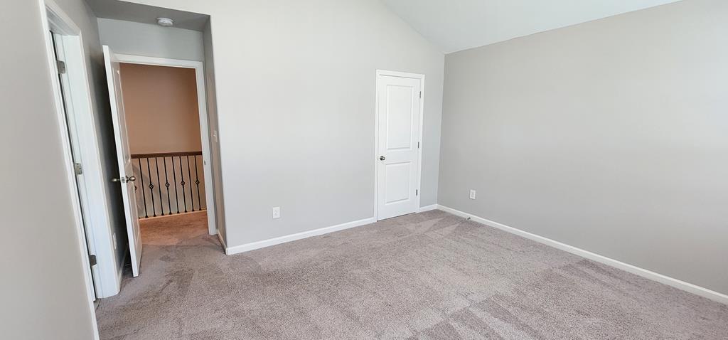 486 Abberly Lane Ellerslie, GA 31807 - Photo 25 of 67 a view of an empty room with closet and mirror