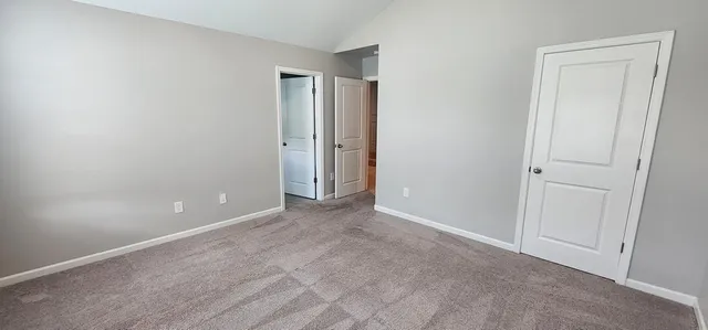 wooden floor and window in an empty room