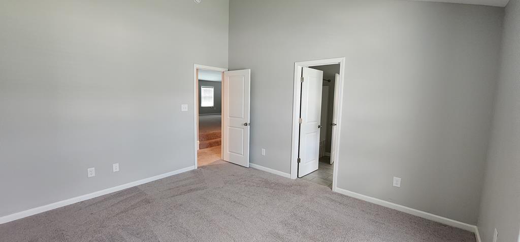 486 Abberly Lane Ellerslie, GA 31807 - Photo 29 of 67 an empty room with closet and a bathroom