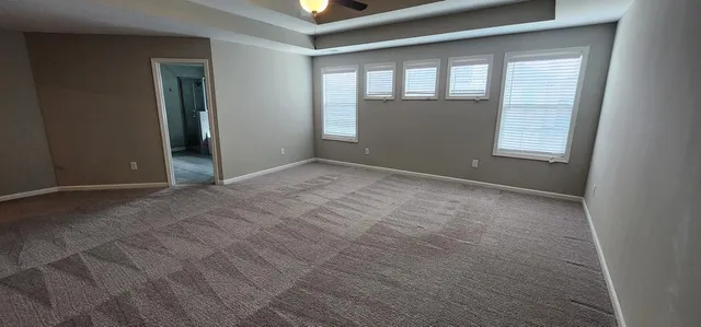 a view of a room with white walls