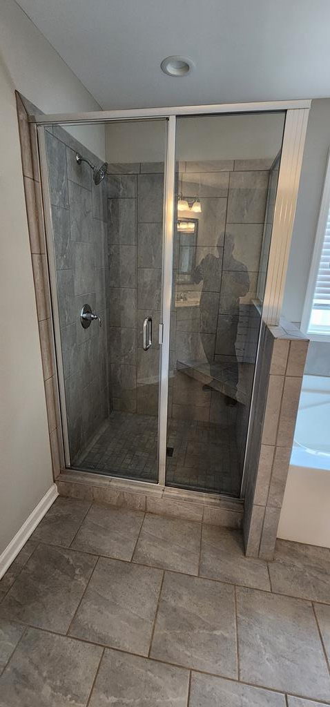 486 Abberly Lane Ellerslie, GA 31807 - Photo 39 of 67 a bathroom with a glass door shower and toilet