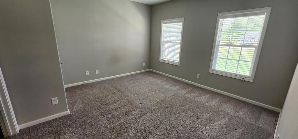 486 Abberly Lane Ellerslie, GA 31807 - Photo 5 of 67 an empty room with windows