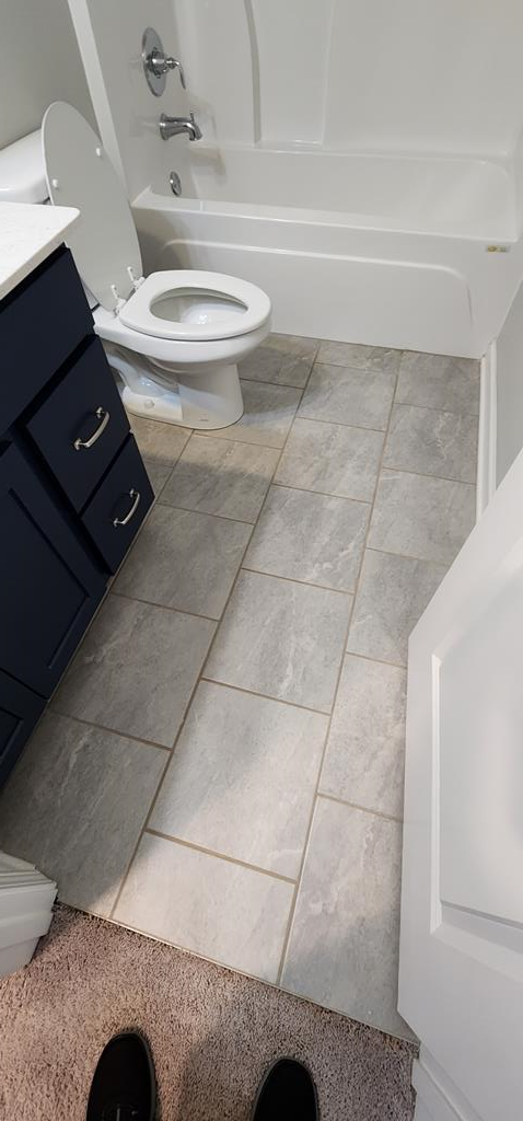 486 Abberly Lane Ellerslie, GA 31807 - Photo 51 of 67 a bathroom with a toilet and a vanity