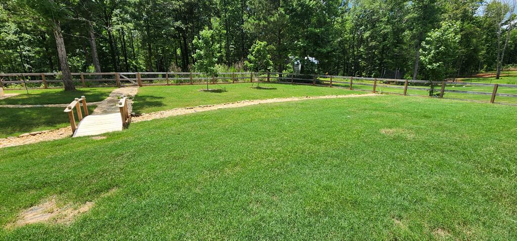 486 Abberly Lane Ellerslie, GA 31807 - Photo 57 of 67 a view of a big yard with a park