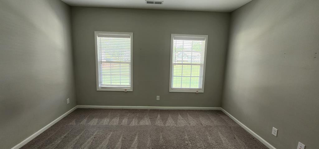 486 Abberly Lane Ellerslie, GA 31807 - Photo 6 of 67 an empty room with a window