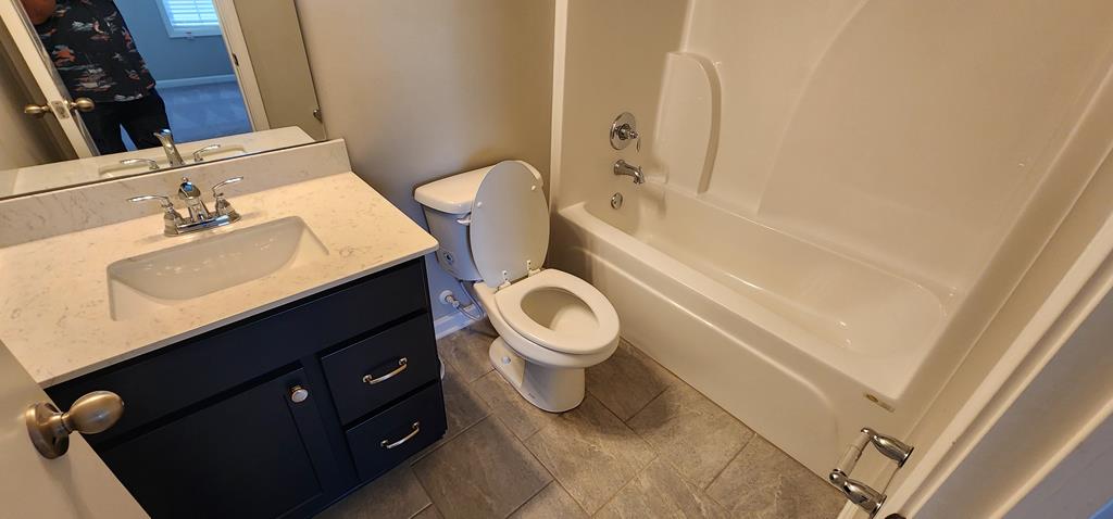 486 Abberly Lane Ellerslie, GA 31807 - Photo 7 of 67 a bathroom with a sink a toilet and shower
