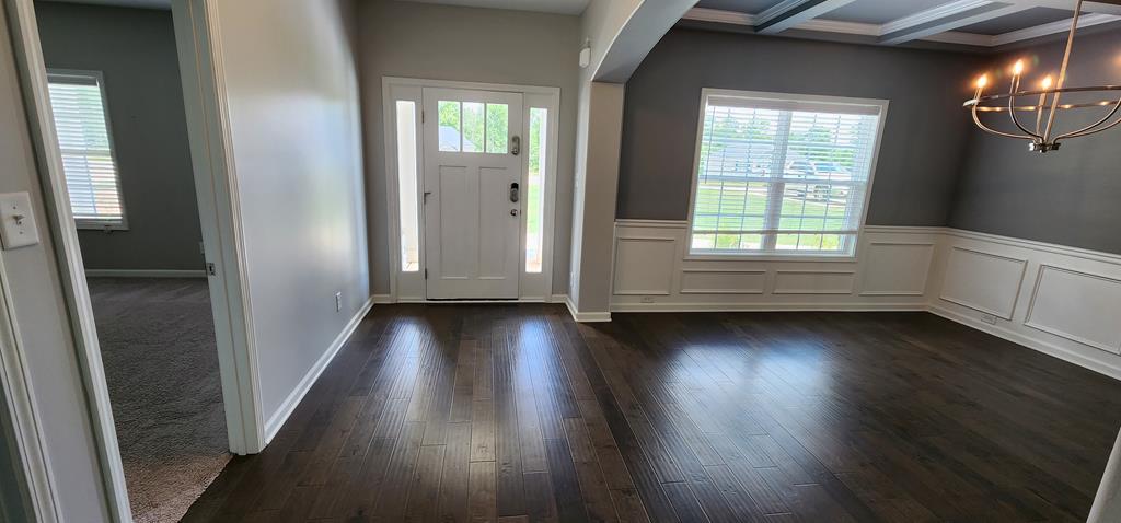 486 Abberly Lane Ellerslie, GA 31807 - Photo 9 of 67 an empty room with wooden floor and windows