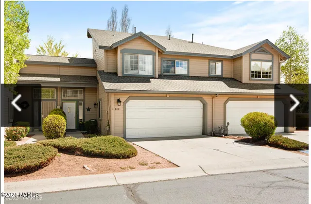 a front view of a house with entertaining space