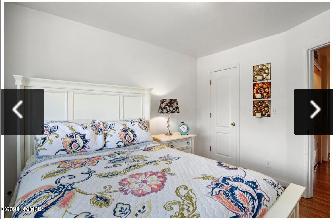 4011 East Village Circle Flagstaff, AZ 86004 - Photo 12 of 23 a bedroom with a bed and window