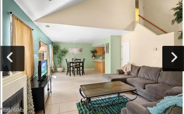 a kitchen with a sink a stove and cabinets