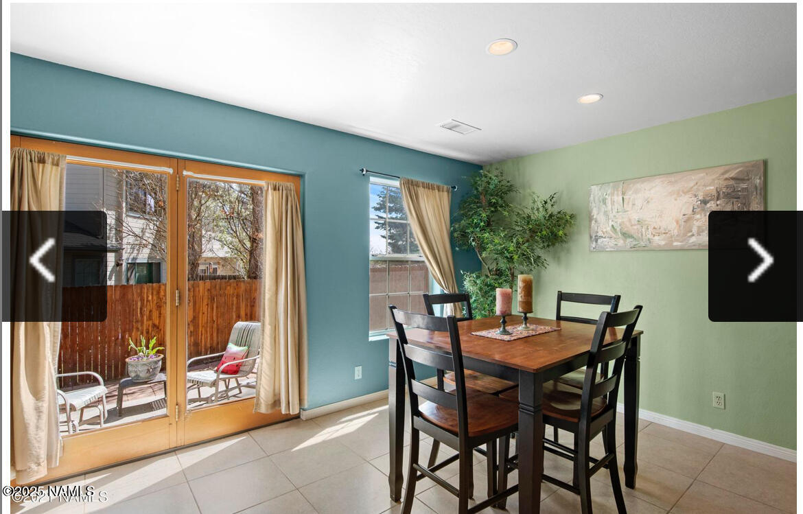 4011 East Village Circle Flagstaff, AZ 86004 - Photo 10 of 23 a dining room with furniture and window