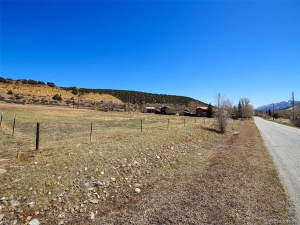 a view of a beach with a ocean view