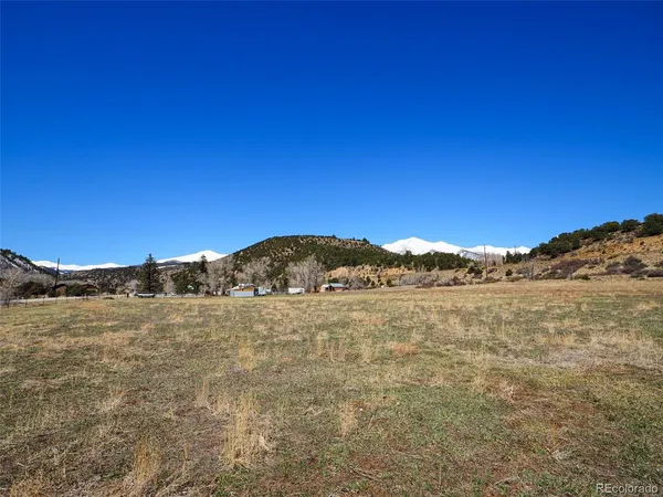 a view of mountain with lake view