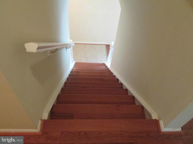 8270 Raindrop Way Springfield, VA 22153 - Photo 20 of 30 Hardwood stairs!!