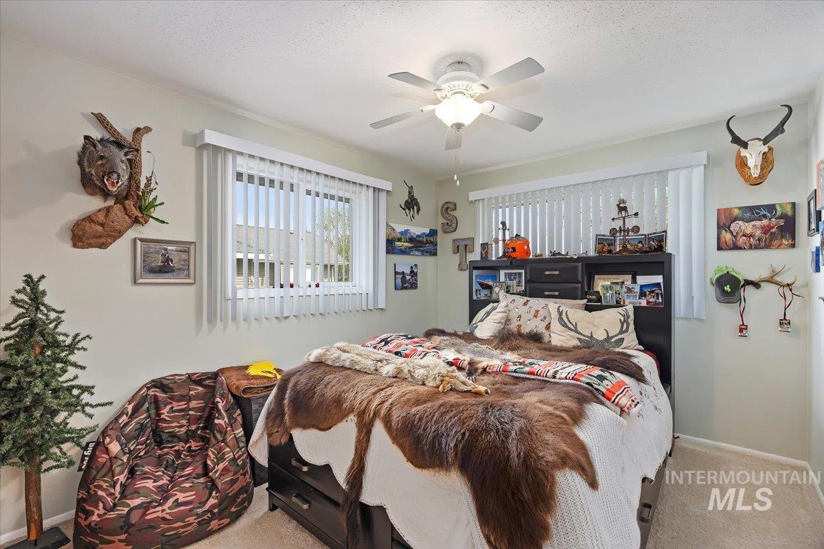 1301 A Street Rupert, ID 83350 - Photo 26 of 45 Bedroom featuring carpet floors and ceiling fan