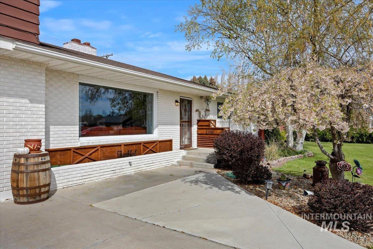 1301 A Street Rupert, ID 83350 - Photo 4 of 45 Entrance to property featuring brick siding and a chimney