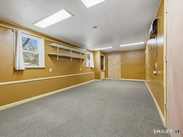 a front view of a house with swimming pool