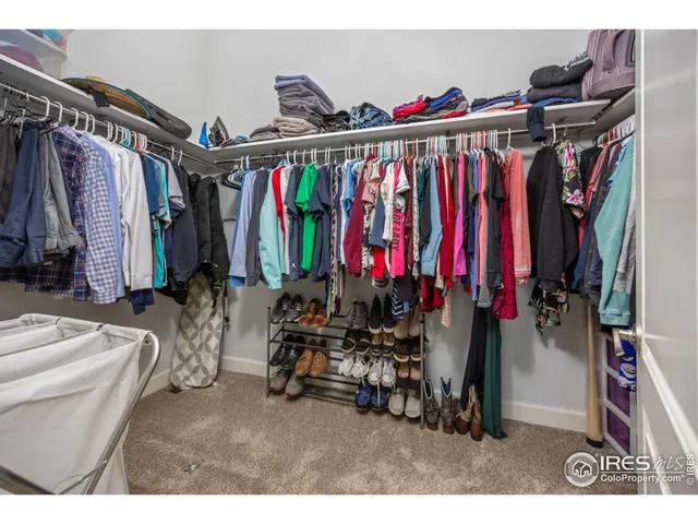 a view of a garage with a bike and a car
