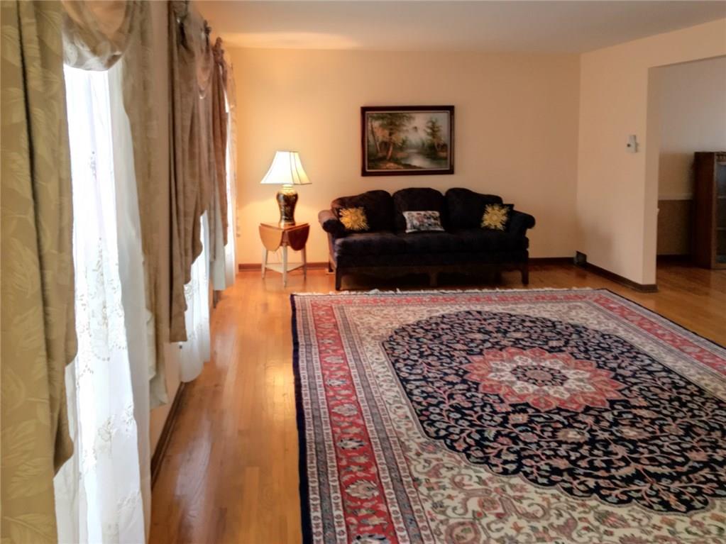 508 Kerrwood Road Pittsburgh, PA 15215 - Photo 7 of 18 LARGE LIVING ROOM WITH LOTS OF NATURAL LIGHT AND HARDWOOD FLOORING