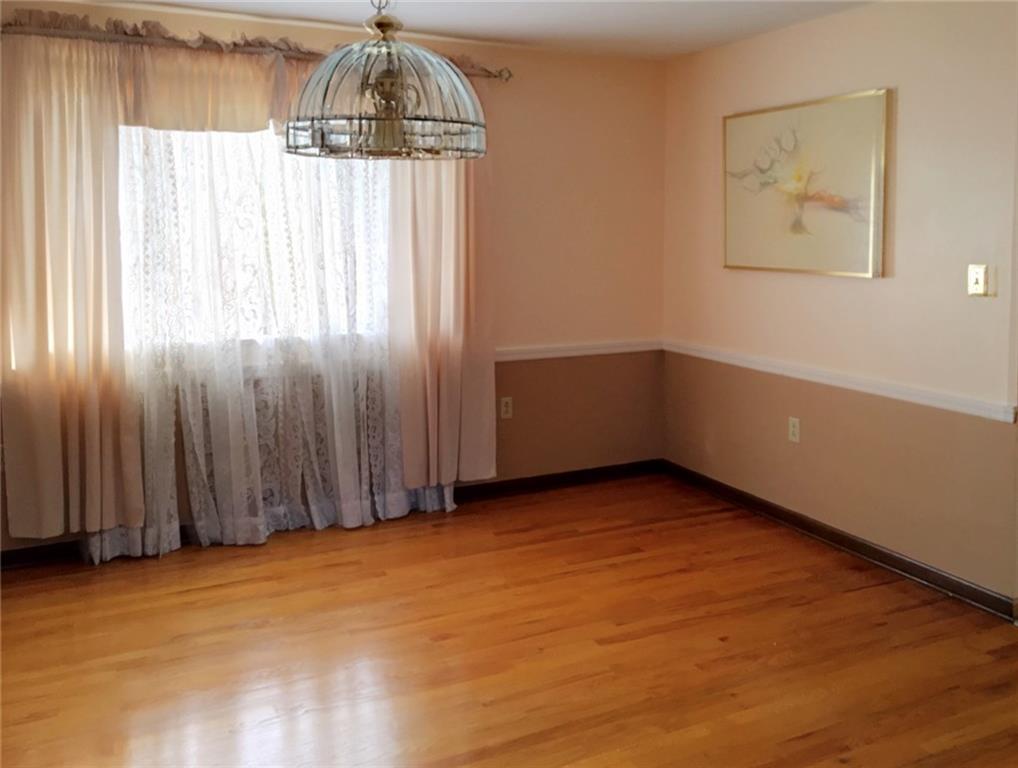 508 Kerrwood Road Pittsburgh, PA 15215 - Photo 9 of 18 DINING ROOM WITH HARDWOOD FLOORING