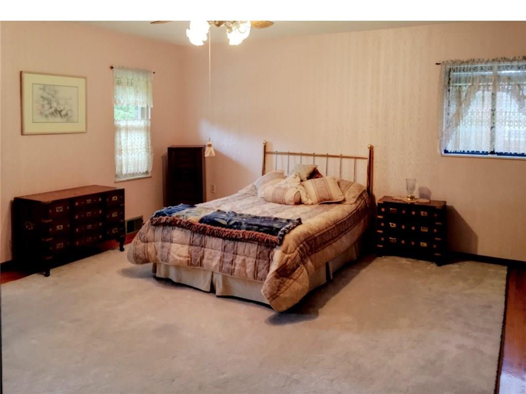 508 Kerrwood Road Pittsburgh, PA 15215 - Photo 10 of 18 MASTER BEDROOM WITH HARDWOOD FLOORING AND FULL BATH ACCESS