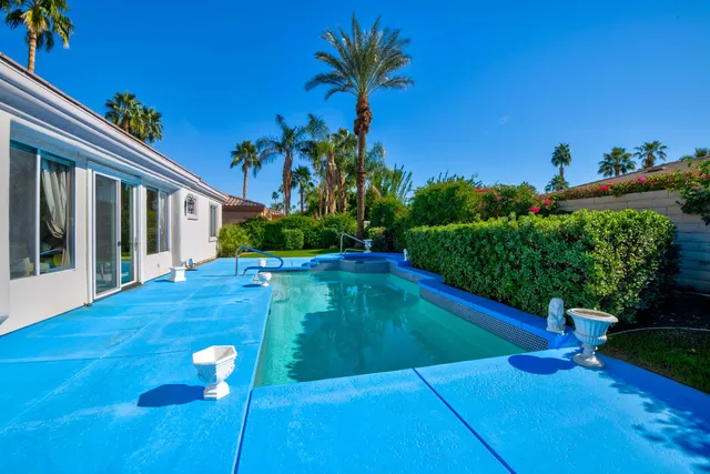 a view of a backyard house with a patio