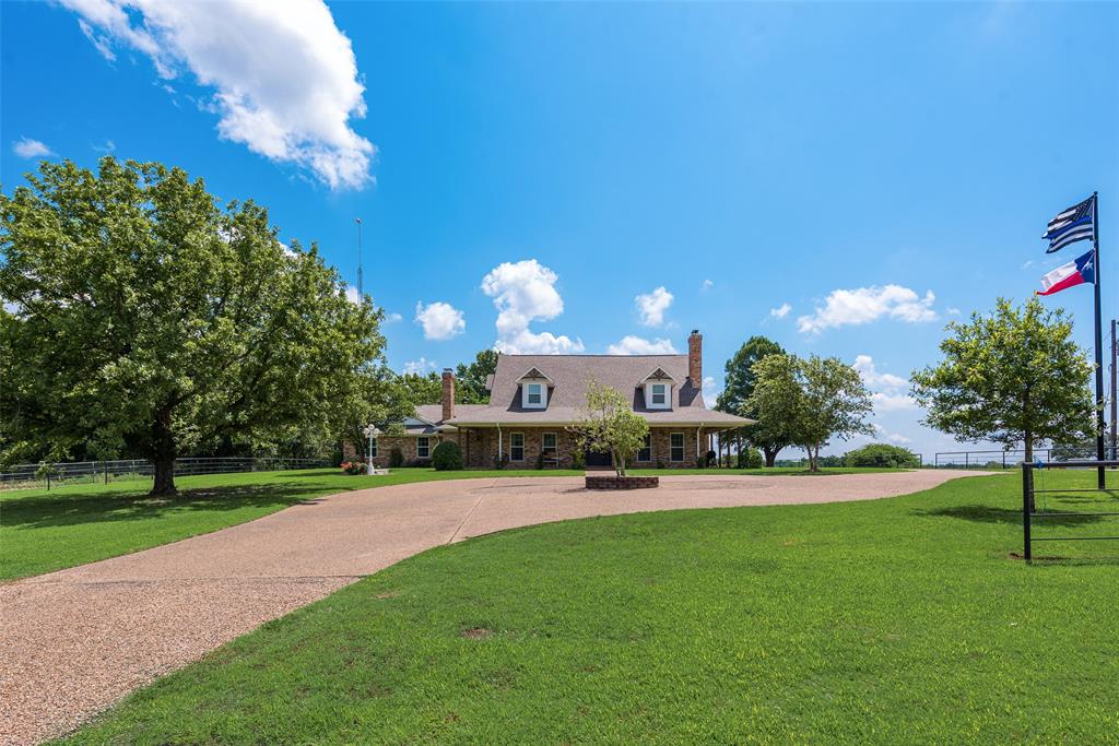 669 VZ County Road Canton, TX 75103 - Photo 6 of 40 a view of a house with a yard and a fountain