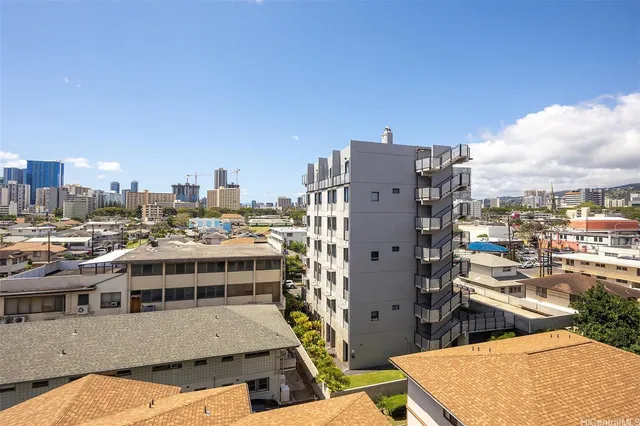 a view of a city with tall buildings
