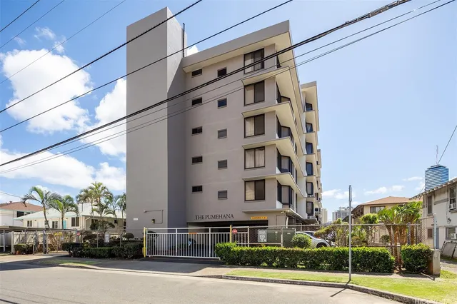 a view of a building and a street