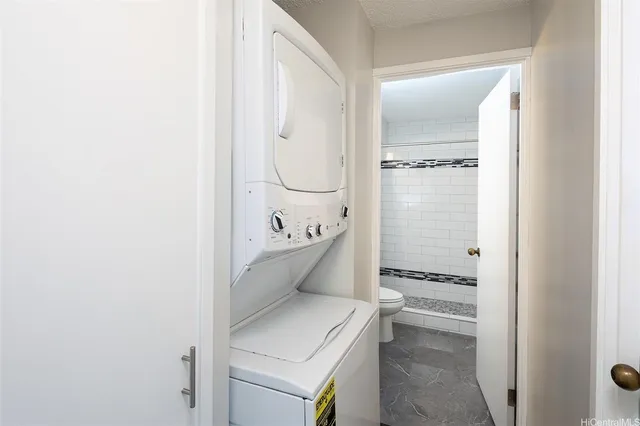 a bathroom with a toilet and a sink