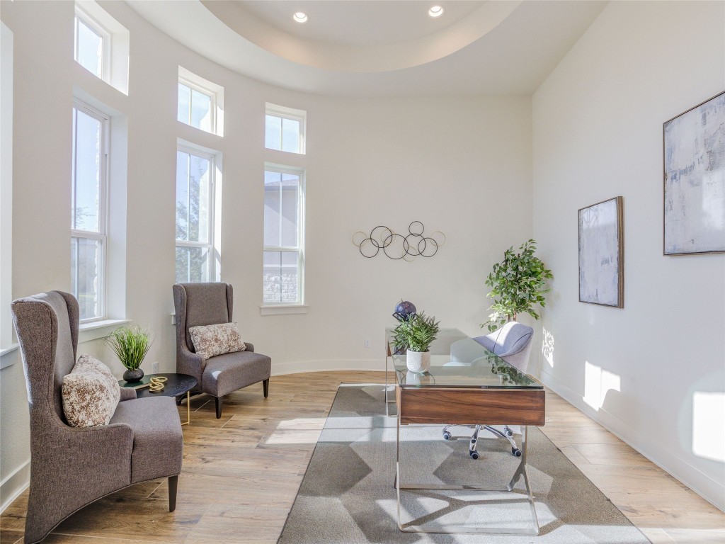 345 Two Creeks Lane Austin, TX 78737 - Photo 13 of 40 a living room with furniture and a potted plant