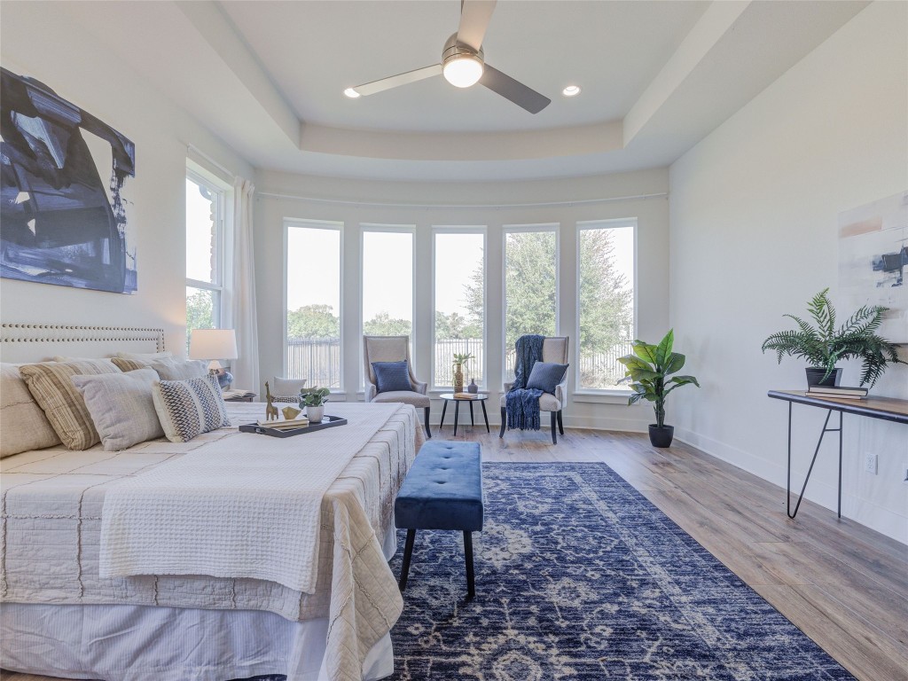 345 Two Creeks Lane Austin, TX 78737 - Photo 18 of 40 a living room with furniture and a large window