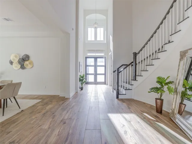a view of entryway with wooden floor