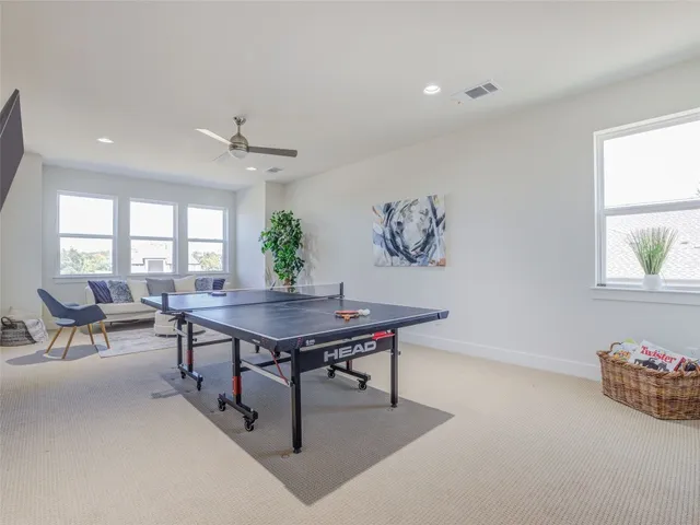 a view of a livingroom with furniture and window