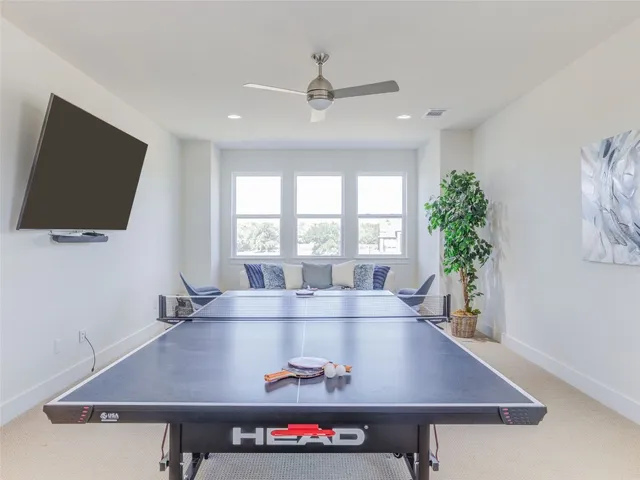 a view of a living room and dining room