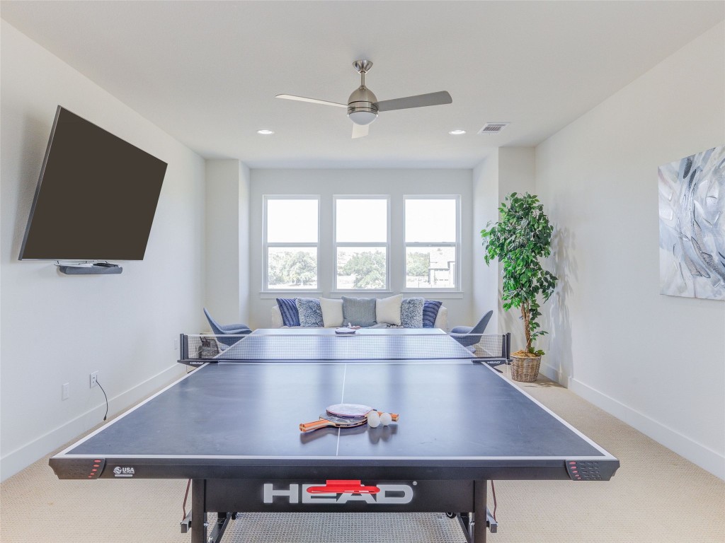 345 Two Creeks Lane Austin, TX 78737 - Photo 26 of 40 a view of a living room and dining room