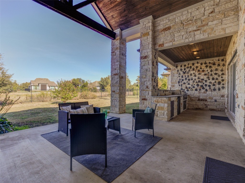 345 Two Creeks Lane Austin, TX 78737 - Photo 36 of 40 a view of a terrace with furniture and city view