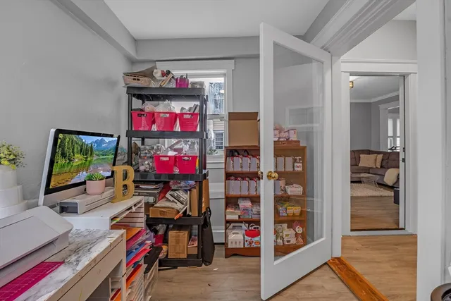 a living room with lots of furniture and a flat screen tv