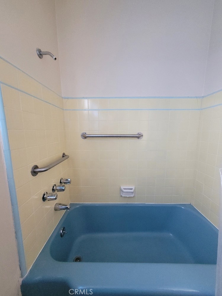 14030 Dittmar Drive Whittier, CA 90605 - Photo 13 of 32 a bathroom with a bathtub