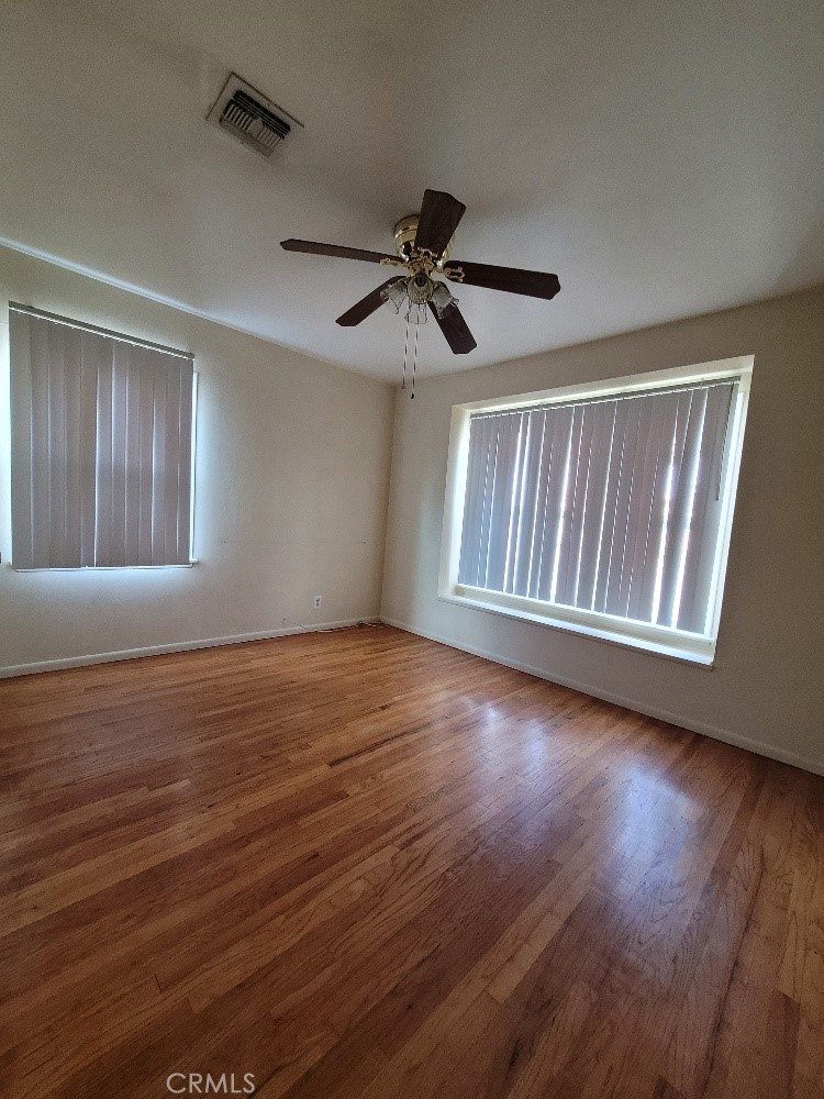 14030 Dittmar Drive Whittier, CA 90605 - Photo 20 of 32 a view of an empty room with wooden floor and a window