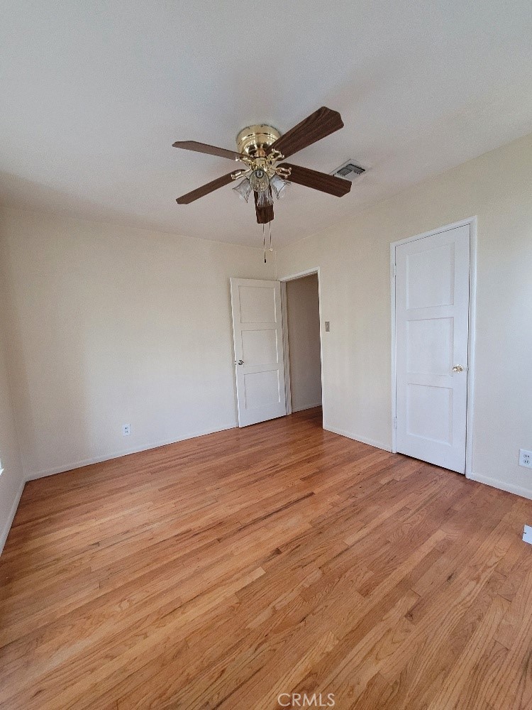 14030 Dittmar Drive Whittier, CA 90605 - Photo 22 of 32 a view of empty room with wooden floor